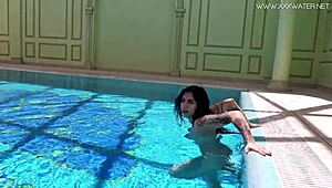Brunette bombshell Sheril Blossom flaunts her big tits and smokes in a steamy video