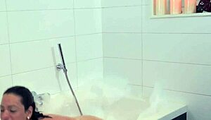 solo shemale tugs hard in steamy bath