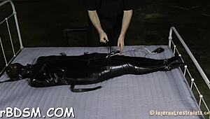 Caged Brunette Babe Pleasures Herself