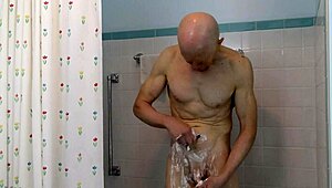 Horny Gay Nudist Shaves Cock in Shower