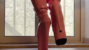 walking tall in pink boots a captivating vision of domination and heels on her ass