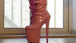 walking tall in pink boots a captivating vision of domination and heels on her ass