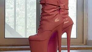 walking tall in pink boots a captivating vision of domination and heels on her ass