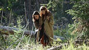 Latina girl masturbates outdoors next to another girl