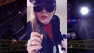 Fetish goddess in police costume dominates