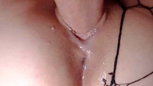 Hey, check this wet pussy getting filled with cum over and over. It's so hot watching her moan with that shaved slit!