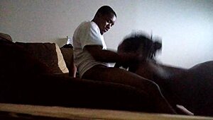 she's sucking her man's monster cock with sloppy enthusiasm