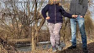 Kinky mommy in leggings gives a great blowjob on the street while I piss