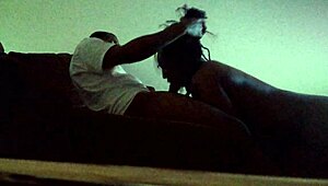 she's sucking her man's monster cock with sloppy enthusiasm