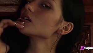 Busty coed Katie Fey poses topless for tit sucking action