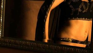 she's a sexy bollywood brunette dancer, stripping and teasing.