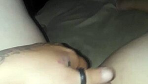 She casually masturbates her pussy in a relaxed home setting, building up to an intense solo session.