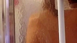 Shy milf showers and shaves her big ass