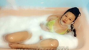 European girl masturbates to intense orgasm in shower