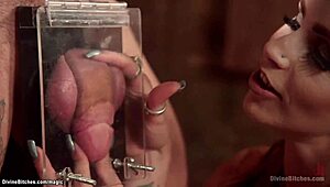 Busty femdom rides bound man's face with strapon submission