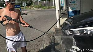 Young guy gets handjob from muscular bodybuilder