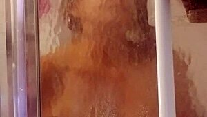 Shy milf showers and shaves her big ass