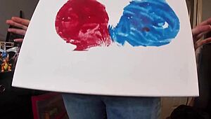 Redhead babe paints her big tits