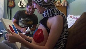 Redhead babe paints her big tits