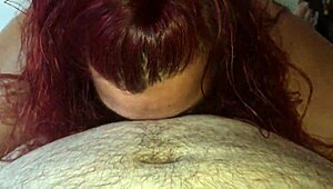 Amateur mature woman gives a blowjob to a small cock