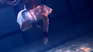 Hanging out by the pool with this sexy Russian teen, Bulava Lozhkova, showing off her big boobs and ass underwater.