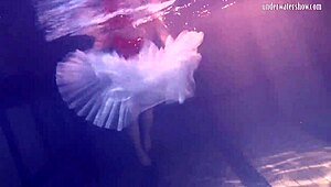 Hanging out by the pool with this sexy Russian teen, Bulava Lozhkova, showing off her big boobs and ass underwater.