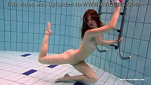 Hungarian teenager Duna Bultihalo flaunts her naked body in a pool