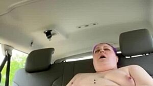 Laina Marie masturbates with vibrator and fingers in truck