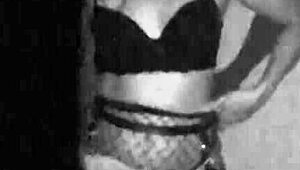 Hotwife dances seductively on Halloween, tempting with tricks or treats in homemade cosplay