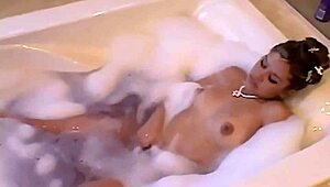 teen topanga rubs herself in the bathtub with slow, teasing strokes