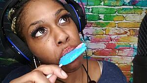 Horny ebony freak sucks lollipop