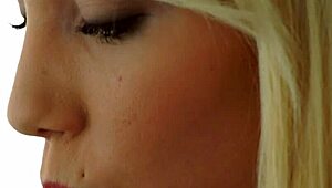 Blonde babe masturbates her shaved pussy all alone in high definition.