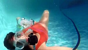 amelie bruna masturbates underwater in the pool, her nude body glistening