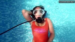 amelie bruna masturbates underwater in the pool, her nude body glistening