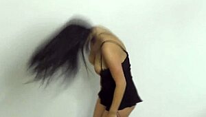 gorgeous brunette with big natural tits sways and teases seductively