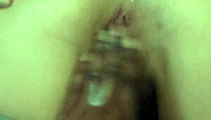 Masturbating wife dripping with sweat in homemade video
