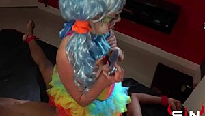 Bound whore in clown costume takes big black cock for hardcore creampie with interracial bondage and blowjob.