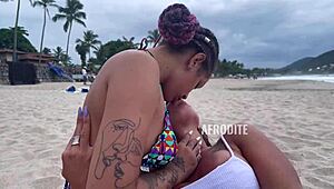 Beach threesome with big asses bent over