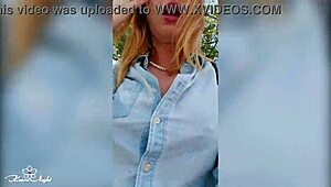 Depraved blonde flashes big tits in public outdoor show