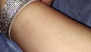 Applying lotion to moist feet