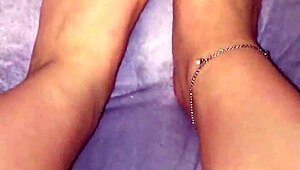 Applying lotion to moist feet