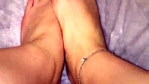 Applying lotion to moist feet