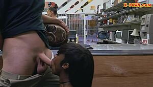 Ghetto woman sells traditional mask in interracial reality setting.