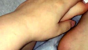 Applying lotion to moist feet