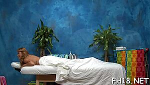 Erotic massage session with sensual touches and oils