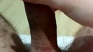 Young amateur strokes his cock for pleasure