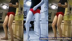 Thin mature guy Alejandro Mistral shows off his big cock in red underwear