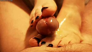 this milf delivers an incredible footjob cumshot closeup on a big cock 😍