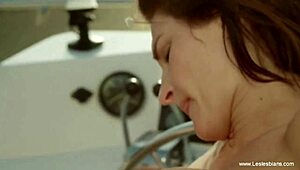 Redhead Stripteases on Stairs for Brunette.