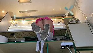 A brunette shop assistant flashes her panties and bends over after being unsatisfied with her work attire